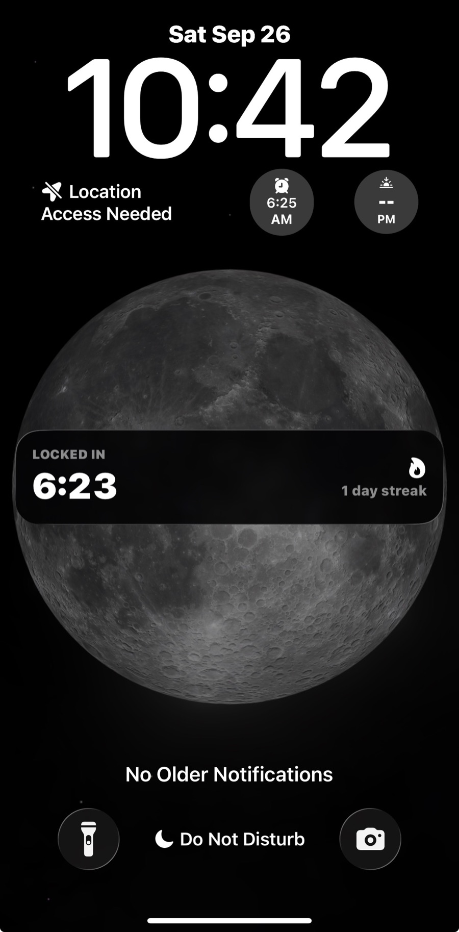 The lock screen: LOCKED IN with a running timer and a 1 day streak